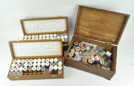 An early 20th century wooden sewing box with tray and contents,
