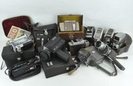 A collection of 20th century film cameras, including Holiday Meter Matic,