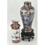 A clobbered Chinese porcelain baluster vase on carved wood stand,