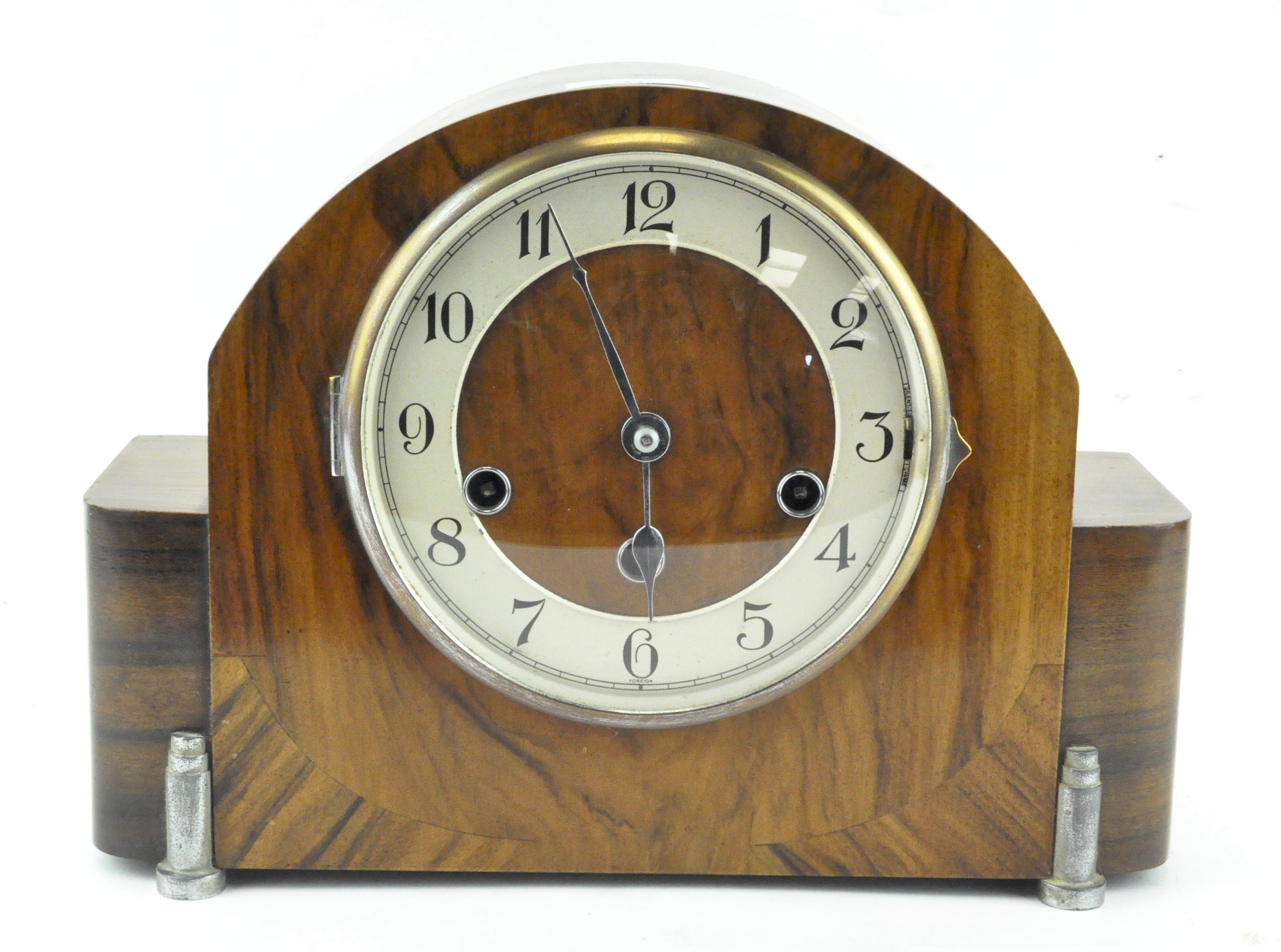 An Art Deco Haller Westminster Chime walnut mantel clock, in arched rectangular case,