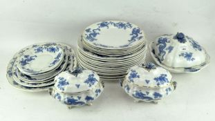 An extensive collection of Booths china, decorated with blue dragons on a white ground,