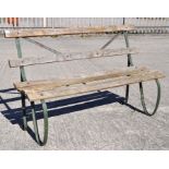 A late 19th century/early 20th century wrought iron bench,