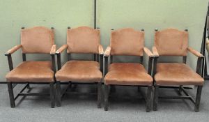 A set of four early 20th century oak chairs, upholstered,