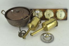 A three dial barometer, a copper footed warmer,