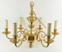 A brass six-light chandelier, in the French 18th century style,