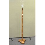 An elm standard lamp,