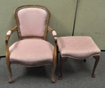 A modern French Louis XV style fauteuil and a similarly upholstered footstool, each in pink damask,