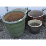 A group of four various glazed plant pots,