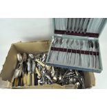 A quantity of assorted flatware, in stainless steel and silver plate,