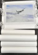 A collection of various aviation related prints, including military planes,