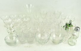 A collection of assorted glassware, including cut glass drinking glasses, in assorted sizes,