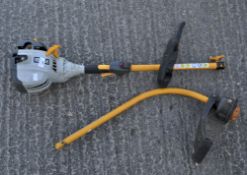 A Kyobi petrol garden strimmer