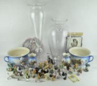 A variety of items, to include figures, two large glass vases,