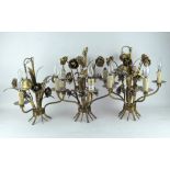 Three gilt metal chandeliers, each with floral spray decoration,