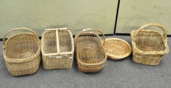 A collection of wicker baskets of varying sizes,