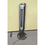 A Sunpentown oscillating fan,