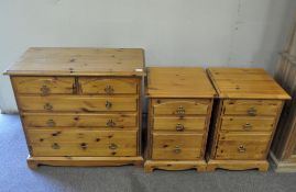 A modern pine chest of drawers and two bedside cabinets,