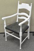 A painted elbow chair, rexin seat,