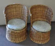 A pair of wicker tub chairs, with William Morris Willow pattern cushions,
