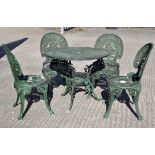 A green painted aluminium garden table and four chairs, the table 67 cm high,