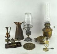 A collection of assorted brassware, to include two oil lamps,