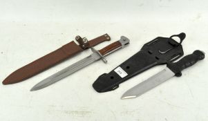 A bayonet marked AK-47 CCCP, together with a diver's knife,
