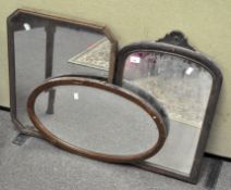 A group of three mirrors, two being dressing table mirrors, the other a wall mirror,