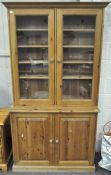 A modern pine bookcase cabinet,