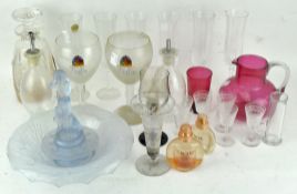 A selection of glassware to include champagne flutes
