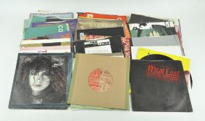 A collection of vintage 7" single vinyl records,