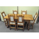 A contemporary elm refectory table and six chairs,