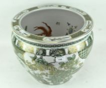 An Asian porcelain jardiniere fish bowl, decorated with gilt and green detailing on a white ground,