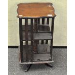 An early 20th century mahogany revolving bookcase,