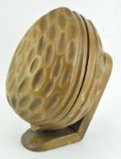 A novelty wooden box, carved in the form of nut, with hinged cover, 20th century,