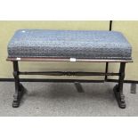 An upholstered hall seat of rectangular form,