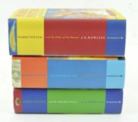 Three hardback Harry Potter books