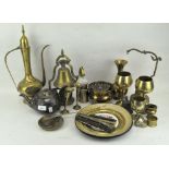 A collection of assorted brassware, including bells, a Turkish coffee-pot and domed cover,