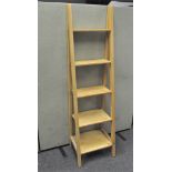 A modern set of Pine 'ladder' shelves, five tiered of graduating form,