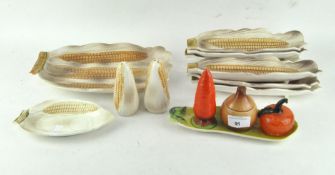 A novelty corn on the cob set of dishes and a matching cruet
