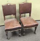 A pair of late Victorian Gillows oak chairs,