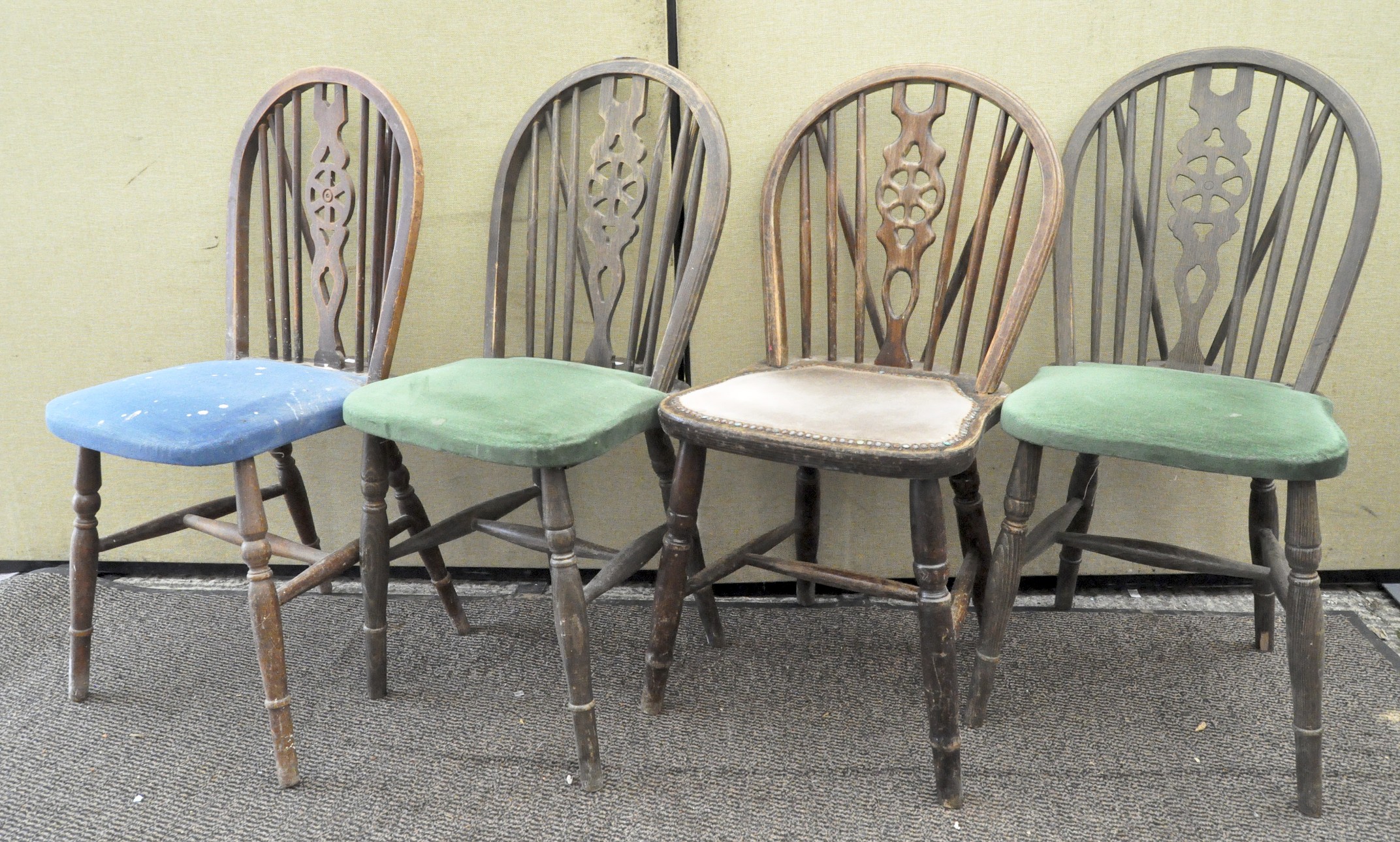 Four wheel back dining chairs,