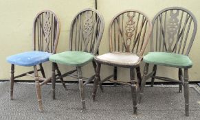 Four wheel back dining chairs,