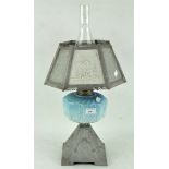 A Victorian oil lamp, cast metal base with opaline style glass reservoir, shade and glass funnel,