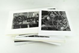 A portfolio of dark room prints with photograph notes,