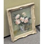 An oil painting, still life of flowers in a vase, mounted in ornate frame, signed to bottom right,