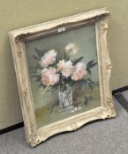 An oil painting, still life of flowers in a vase, mounted in ornate frame, signed to bottom right,