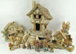 A large collection of Pendelfin figures and cottages,