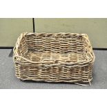 A large bakers bread basket,