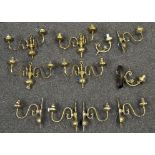 A collection of brassware wall lights,