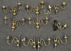 A collection of brassware wall lights,